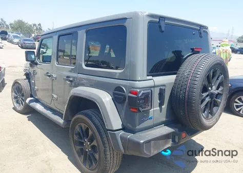 2023 Jeep Wrangler 4Xe Sahara 4X4 from USA, damaged, VIN 1C4JJXP63PW524366